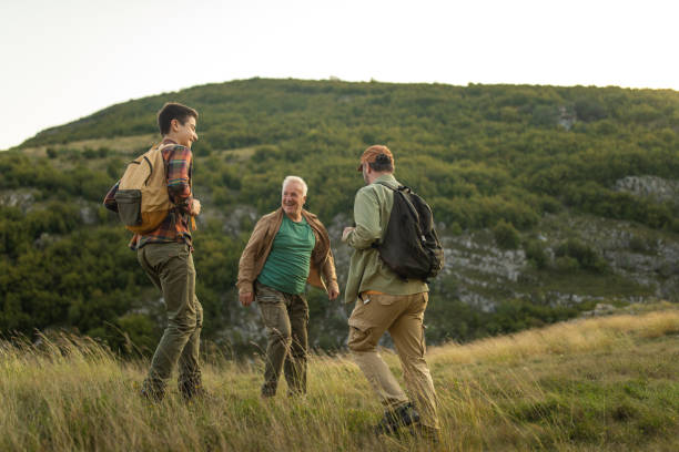 istock Multi-generation family is happy about climbing mountain together 1272822114