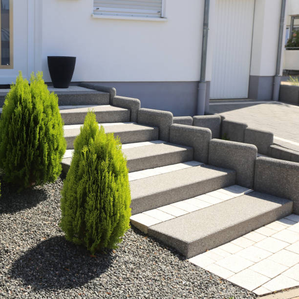 istock Neat and tidy front yard with solid block steps, decorative gravel and planting 1272822718
