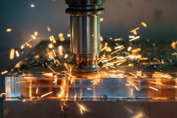 istock The burning chip from CNC milling machine rough cutting  by index-able  end-mill tools. 1272826654