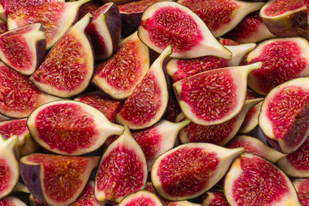 istock Tasty figs background. Top view. 1272826786
