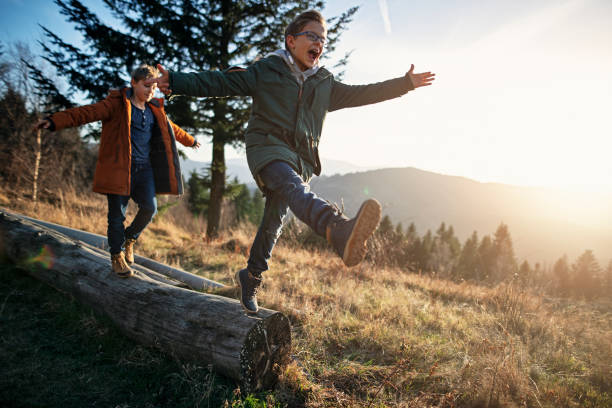 istock Little hikers enjoying autumn nature 1272828528