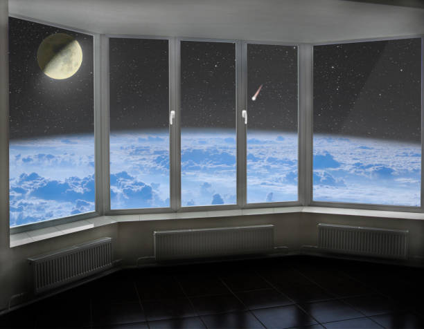istock Room window with view to space above Earth's atmosphere Moon comet and cosmos 1272834053