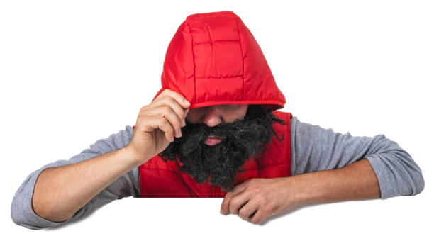 istock Blank sign - man in a red hood hiding his face (isolated on white) 1272834973