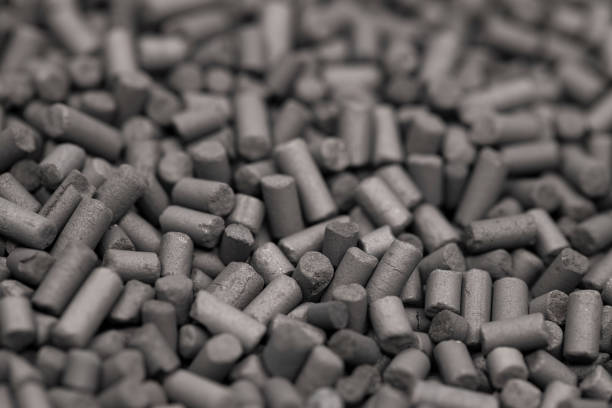 Activated carbon granules abstract background. Activated carbon granules abstract background. Macro shot. Selective focus. aquarium photos stock pictures, royalty-free photos & images