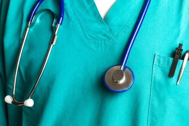 istock Doctor with a stethoscope hanging from his neck 1272838463