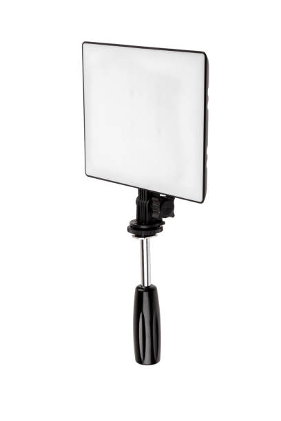 istock Professional lighting equipment for video production isolated on white.  Portable video light for filming video and video blogging. Lighting device for film production. 1272838545