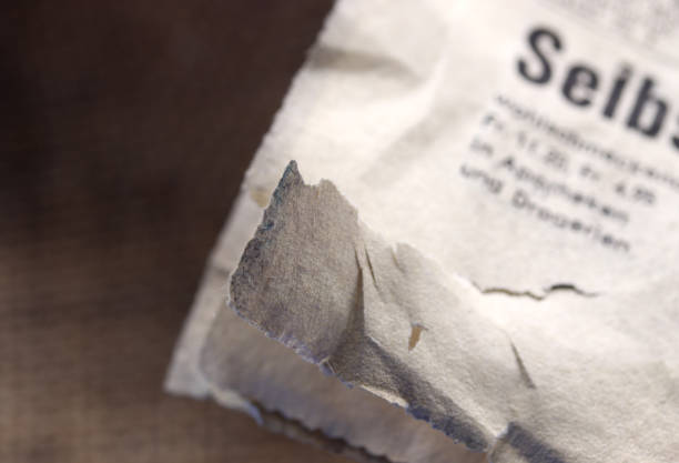 istock close-up old antique newspaper detail 1272838888
