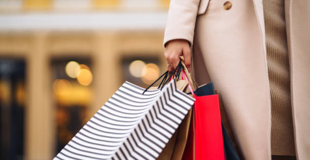 istock Shopping bags in the hands. 1272840020