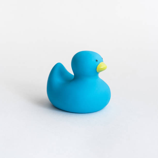 istock Toy blue rubber duck isolated on white background. 1272841678