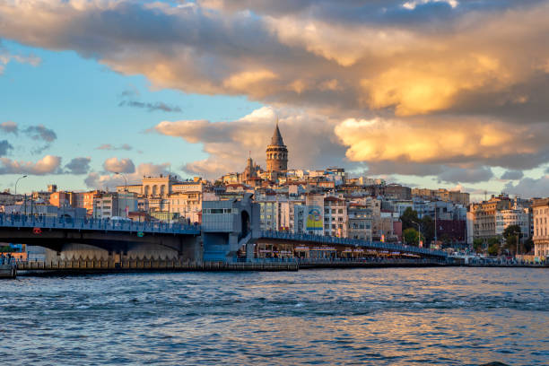 Istanbul, Turkey - Oct 25, 2018: View of the Galata bridge and the Galata Tower. The bridge spans the Golden Horn