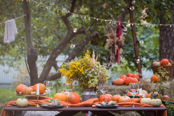 istock Fall themed holiday table setting arrangement for a seasonal party 1272847083
