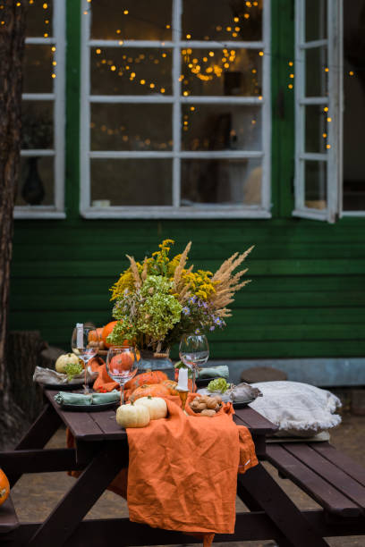 istock Fall themed holiday table setting arrangement for a seasonal party 1272847089