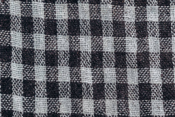istock Close up shot of black and white checks pattern on fabric background 1272847549