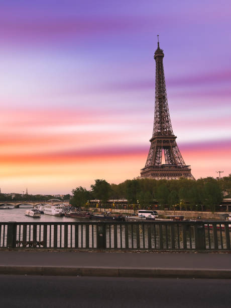 istock Sunset over the the Eiffel Tower in Paris, France 1272849236
