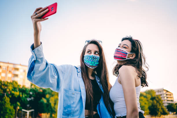 istock Female friends taking selfie 1272849242