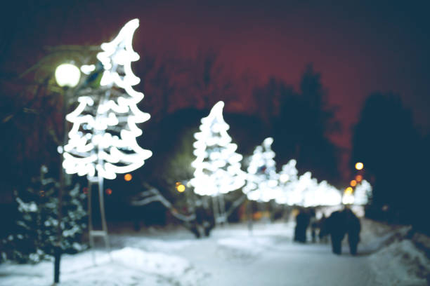 istock Abstract night holiday background with defocused Christmas illumination 1272852025