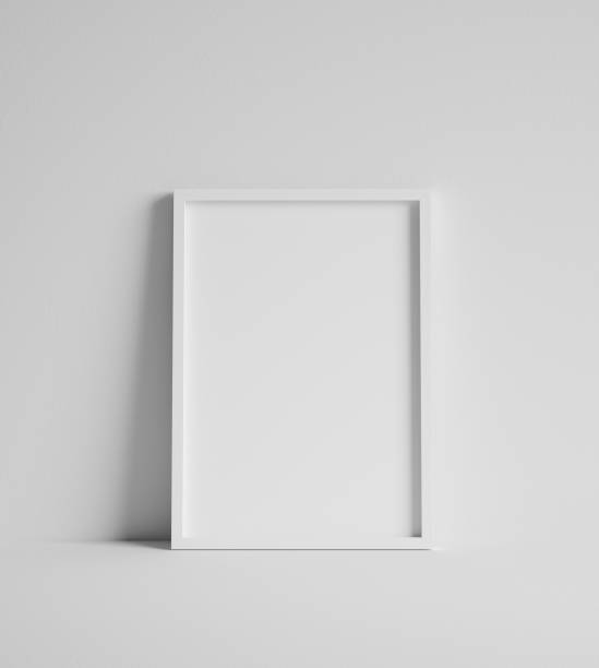istock Mock up poster with white frame close up near wall 1272852168