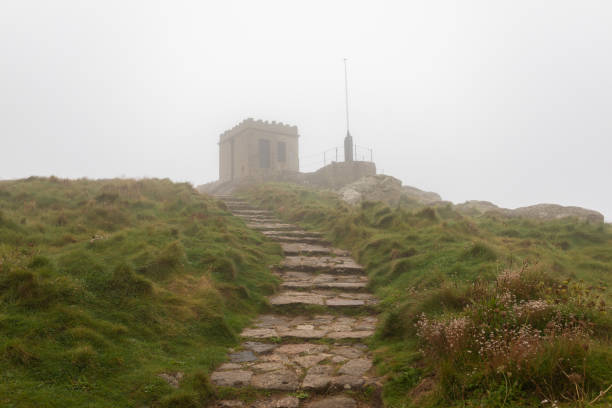 istock Watch tower in the fog 1272855057