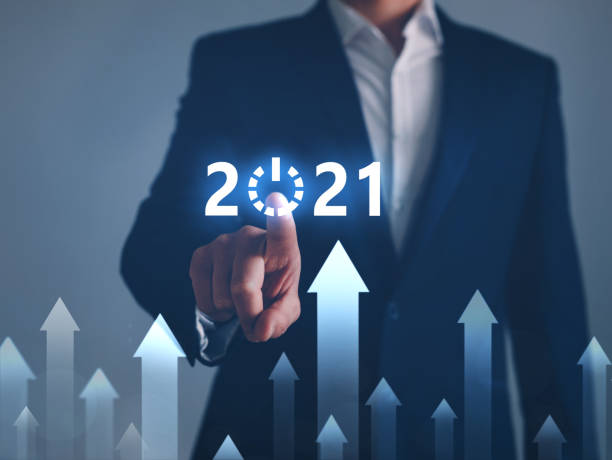 istock Businessman pointing START future button of year 2021. Development to success and growing growth concept. 1272857621