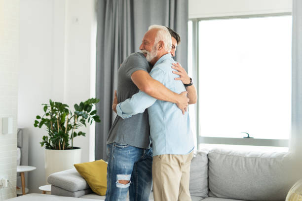 istock Happy father and son reuniting again. 1272857893