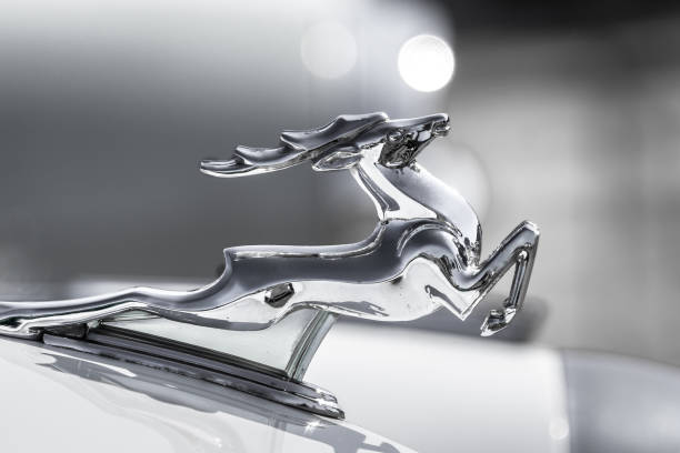 istock Chromed figure of a galloping deer in profile 1272859344