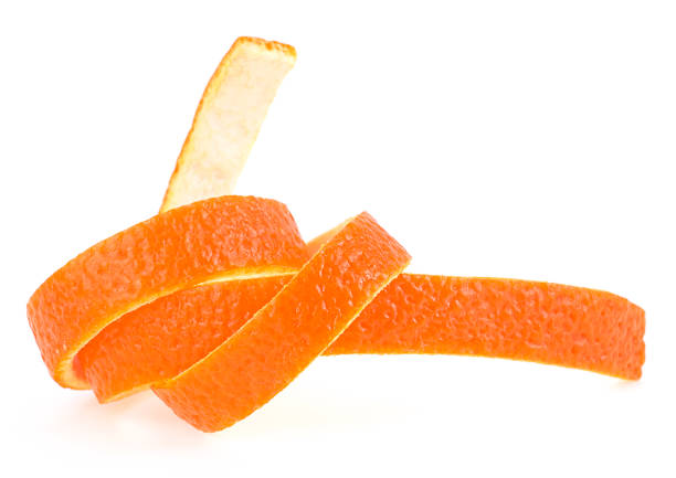 istock Swirling orange peel isolated on a white background. Front view. 1272862497