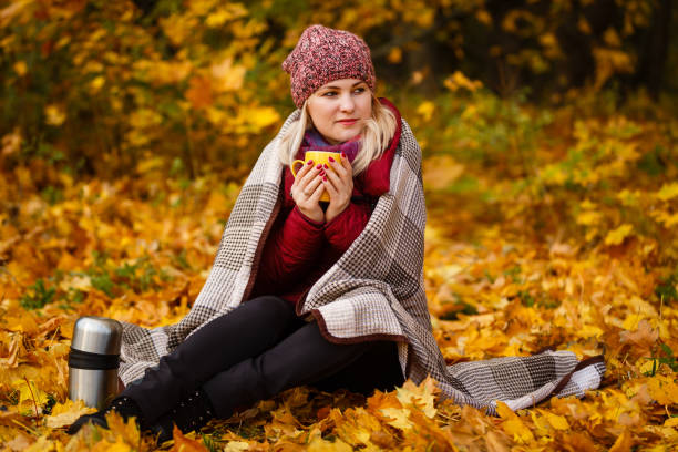 istock woman portret in autumn leaf 1272863620