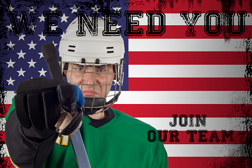 Aspiration. Male hockey player with the stick on ice court background, cropped. Sportsman wearing equipment, preparing for game. Concept of sport, healthy lifestyle, motion, movement, action.