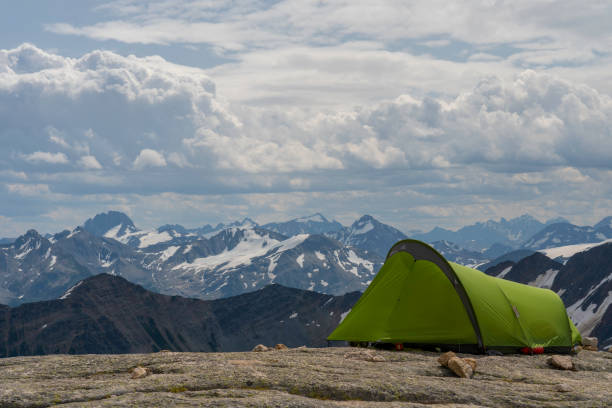 istock Green tent in Bugaboos provincial park, surrounded with mountains and glaciers 1272871788