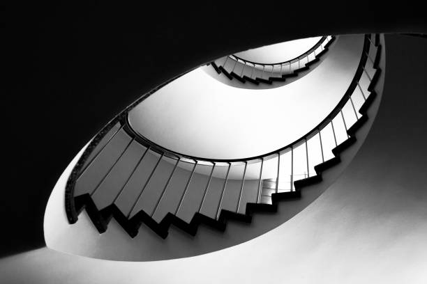 istock Staircases with grey metal handrails forming beautiful pattern 1272871949