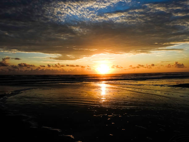 istock Sunrise at New Smyrna Beach, Florida 1272874846