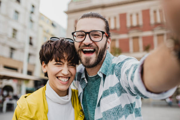 istock Happy couple taking selfie 1272875763