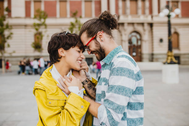istock Young couple embracing outside 1272875878