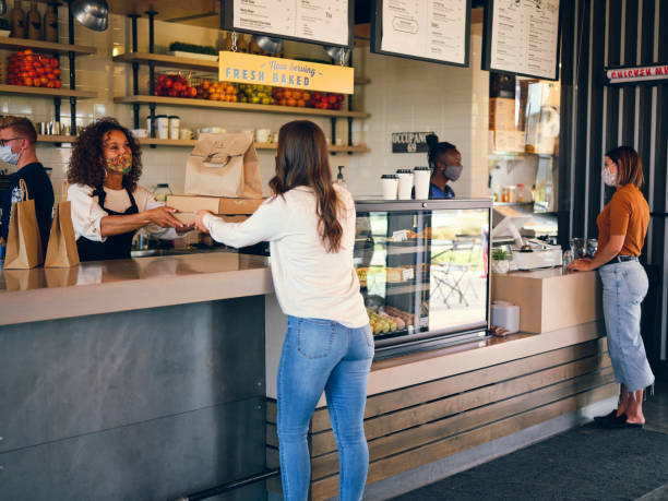 Picking Up Take Out Food in a Cafe