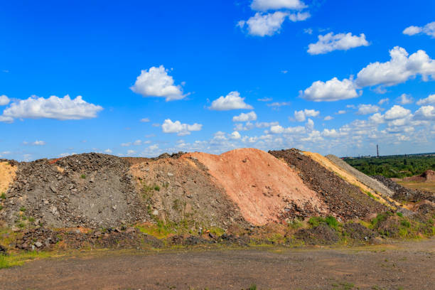 istock View of slag heaps of iron ore quarry. Mining industry 1272885232