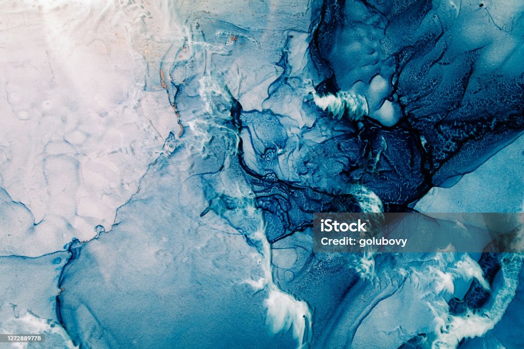 blue acrylic ink marble texture frozen water white Blue acrylic ink. Marble texture. Frozen water surface with white snow effect. Fractured crystal ice rock abstract design. Mineral stone stained pattern. Nature art background. Abstract Stock Photo