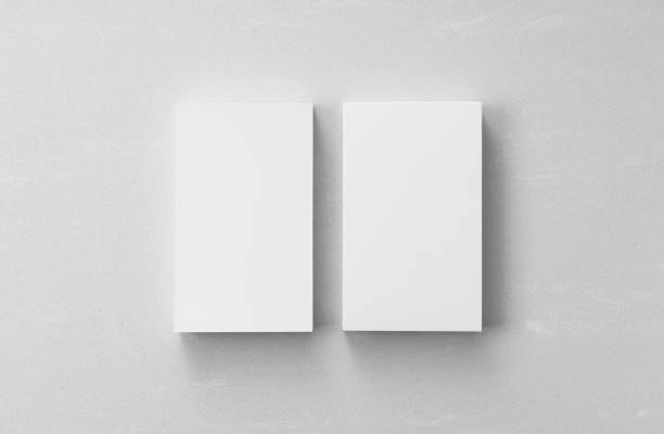 istock A business card placed on a gray background. Overhead shot. 1272904404
