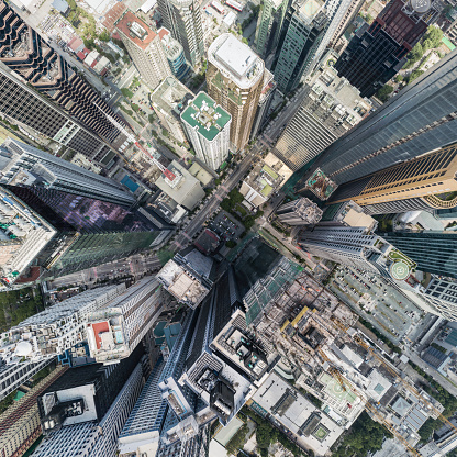 Dramatic overhead view of buildings in Ortigas Business District, Metro Manila. Ultrawide aerial photo