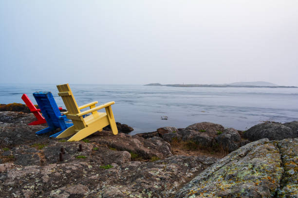 istock Colorful Chairs Overlooking The Ocean 1272909616