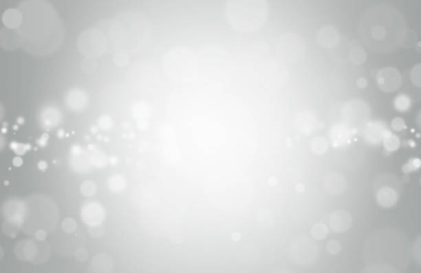 istock White lights bokeh, Defocus glitter blur on gray background. copy space. illustration. Bokeh christmas blurred beautiful shiny. 1272911591