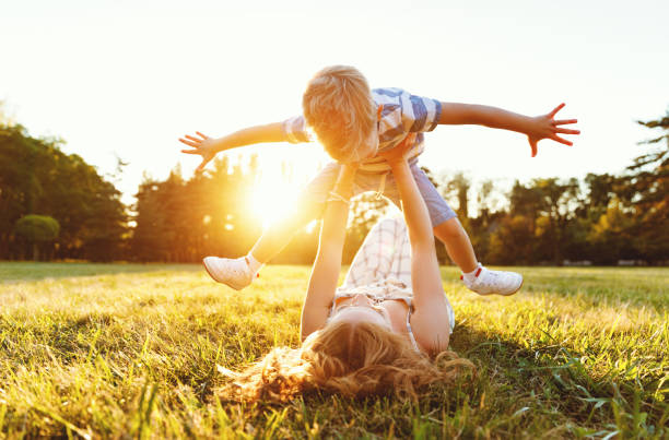 istock Happy family: mother and son in nature in summer 1272913689
