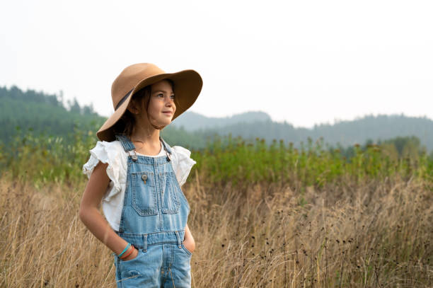 istock Aspirational young girl looking to the future 1272915317