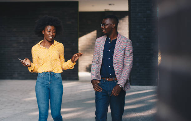 istock A young beautiful curly girl is on a date with a young man, she explains something while he listens to her carefully 1272919259
