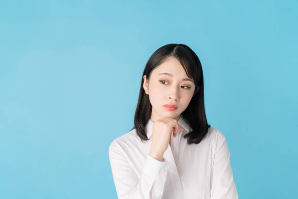 istock Thoughtful young asian girl. 1272920129