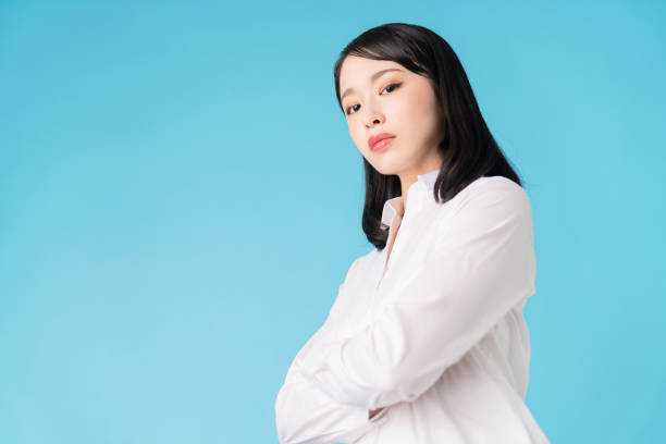 istock Young asian girl looking down. 1272920154