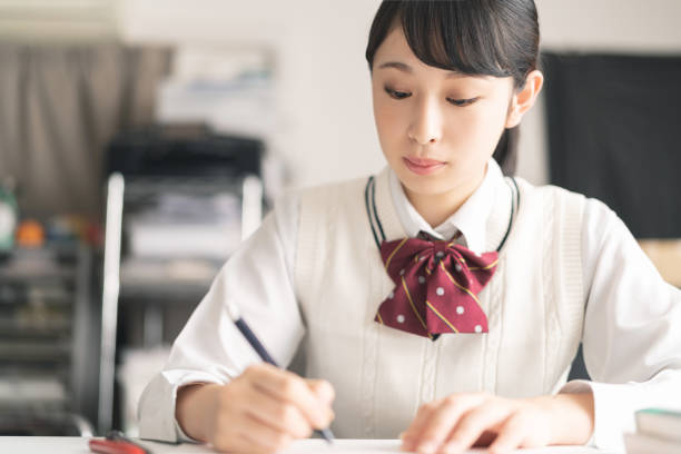 istock Studying asian school girl. 1272924032