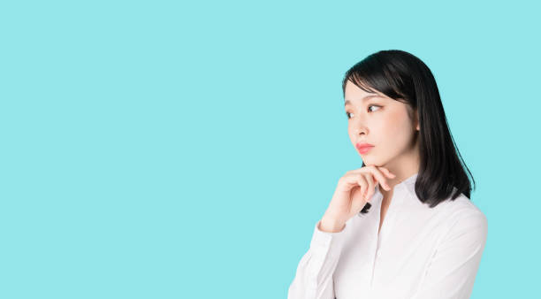istock Thoughtful young asian girl. 1272924244