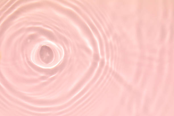istock pink transparent clear water surface texture summer background 1272924794