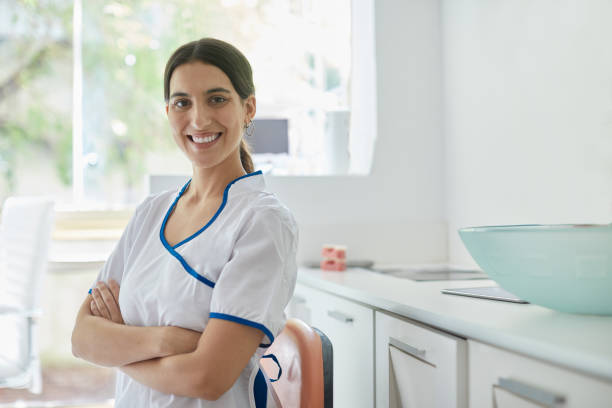 istock Female dentist doctor portrait looking at camera. 1272924830