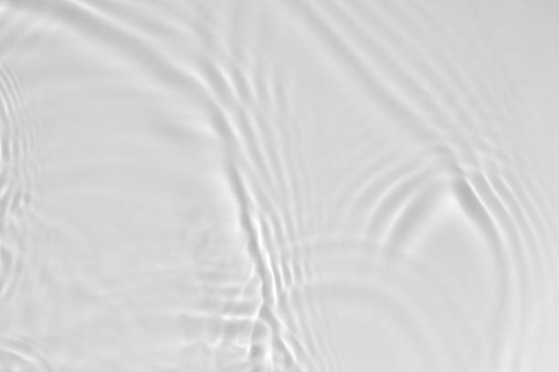 istock desaturated transparent clear calm water surface texture 1272924951